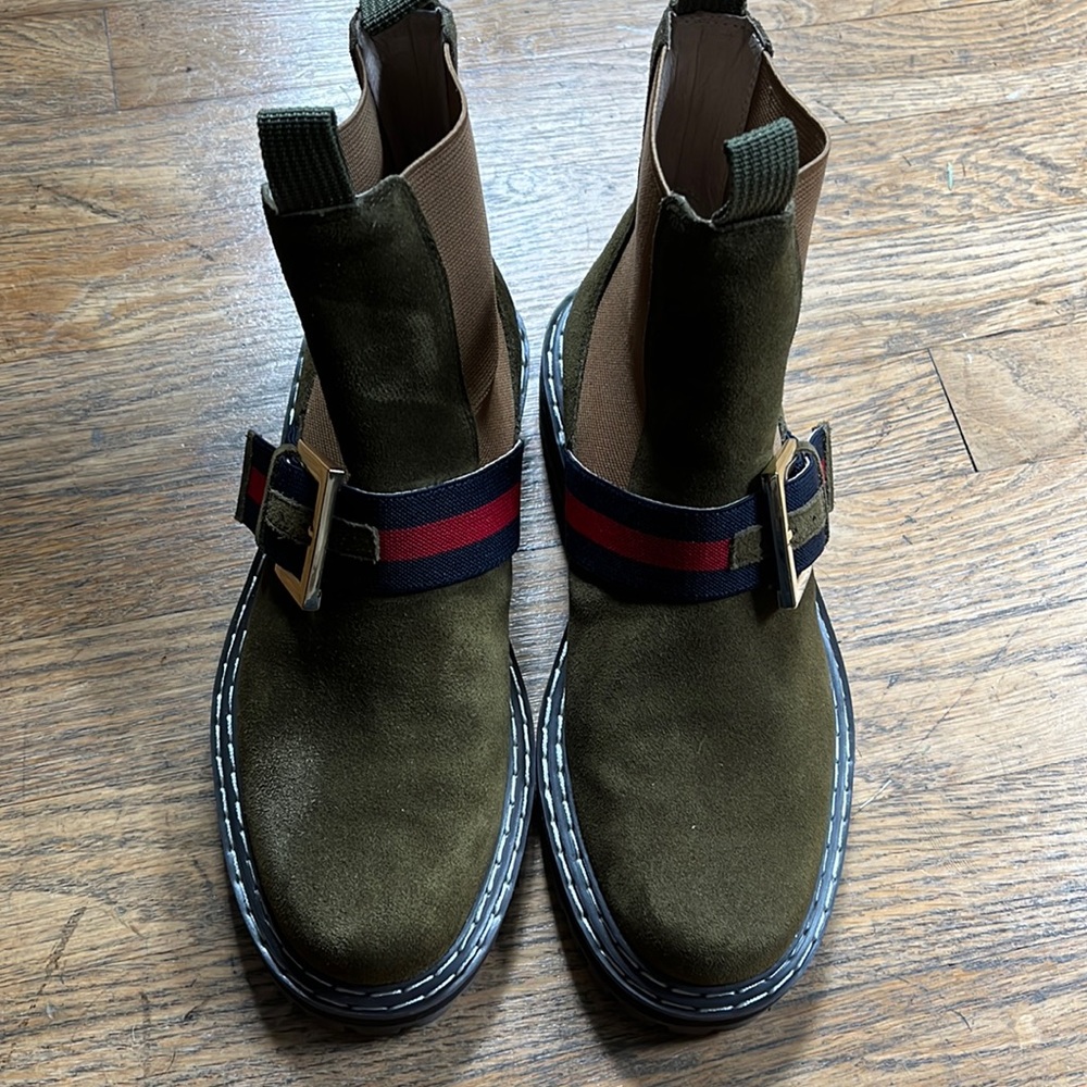 Olive green suede Cecelia NY lug sole boots w/blue & red belts.